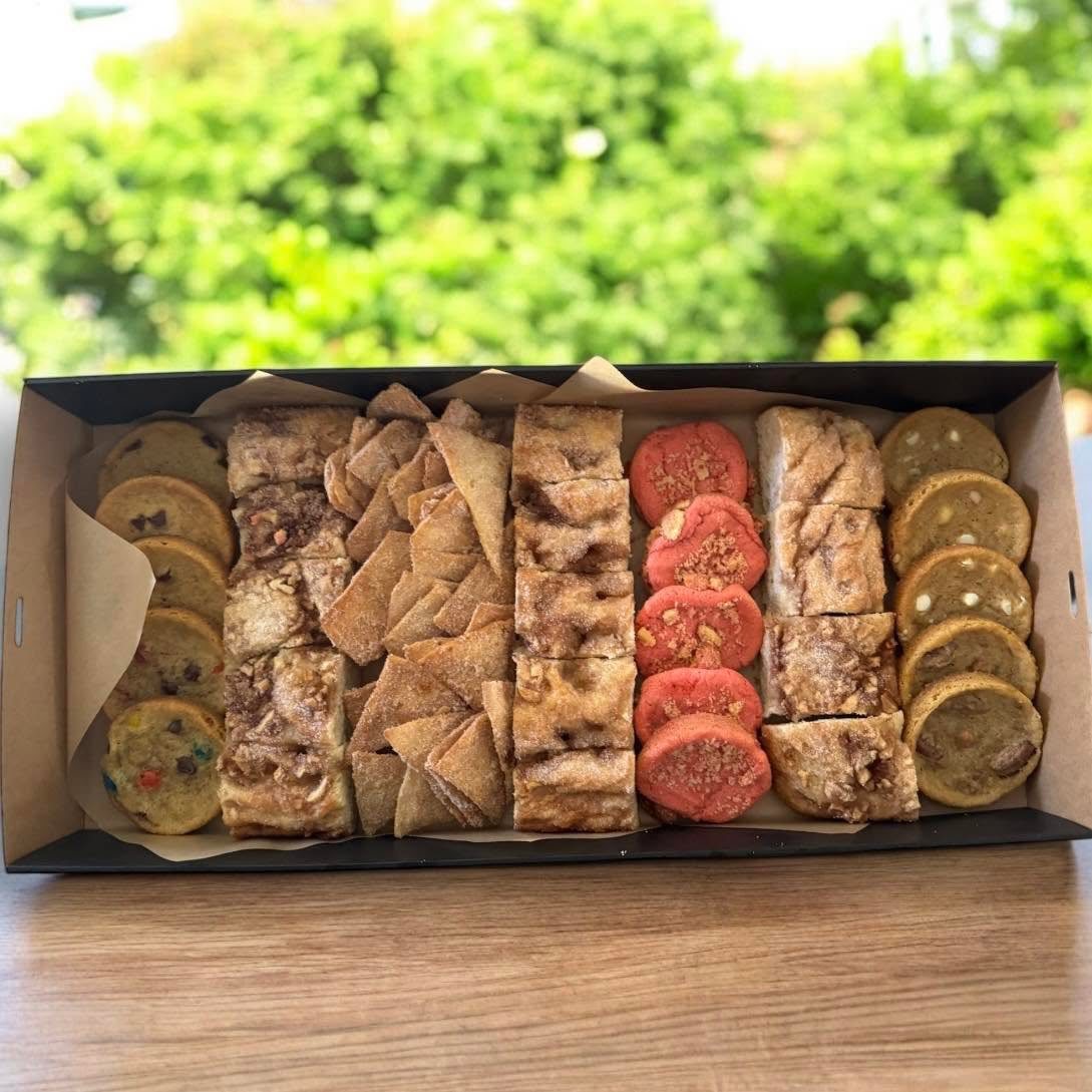 An assorted box of cookies and treats